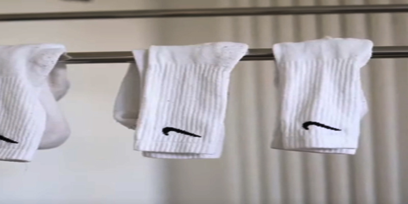 Air Drying white socks with color on them